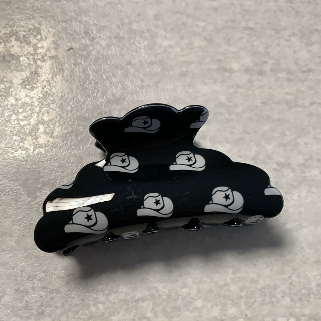Clip with cowboy hats