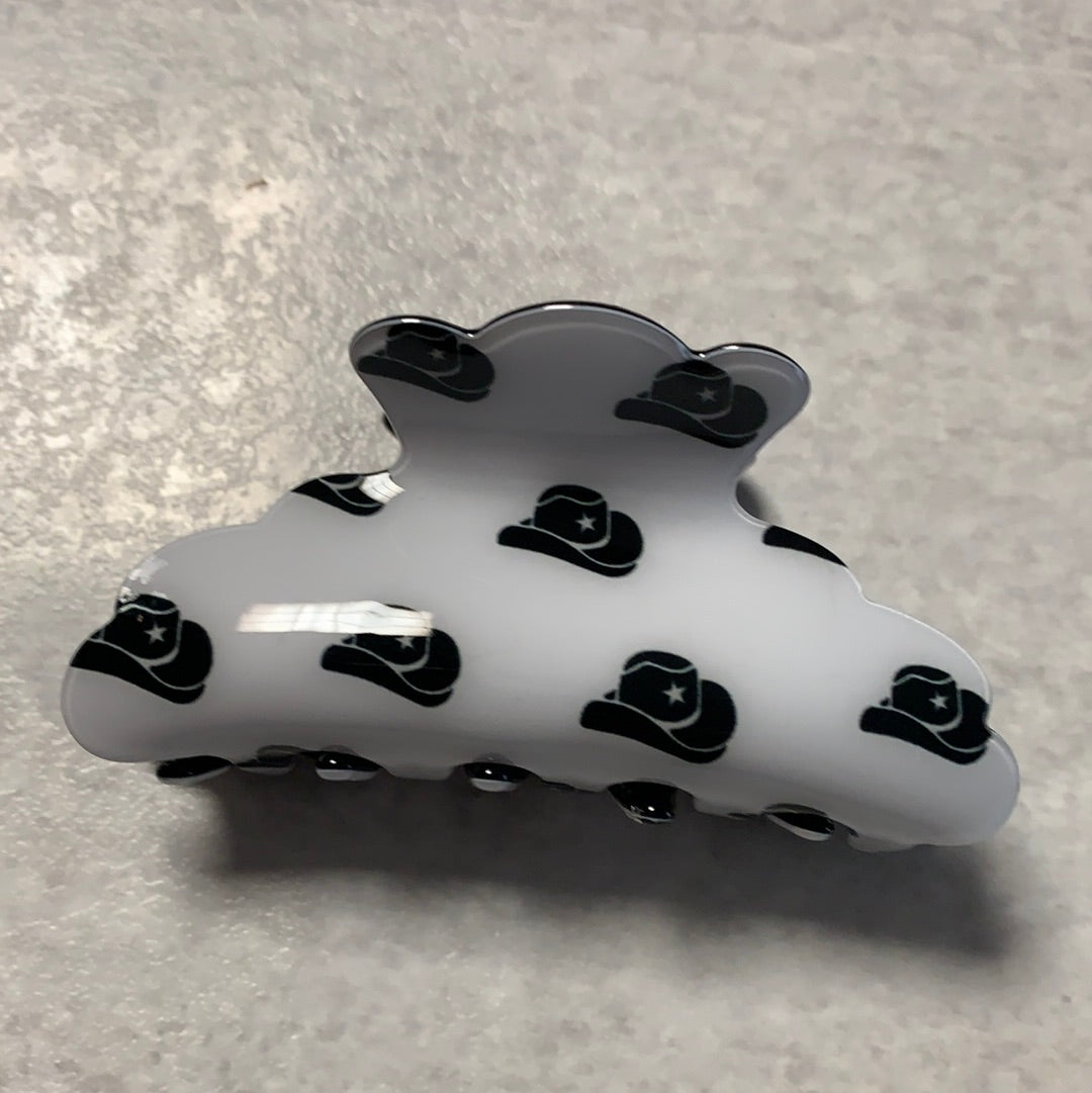 Clip with cowboy hats