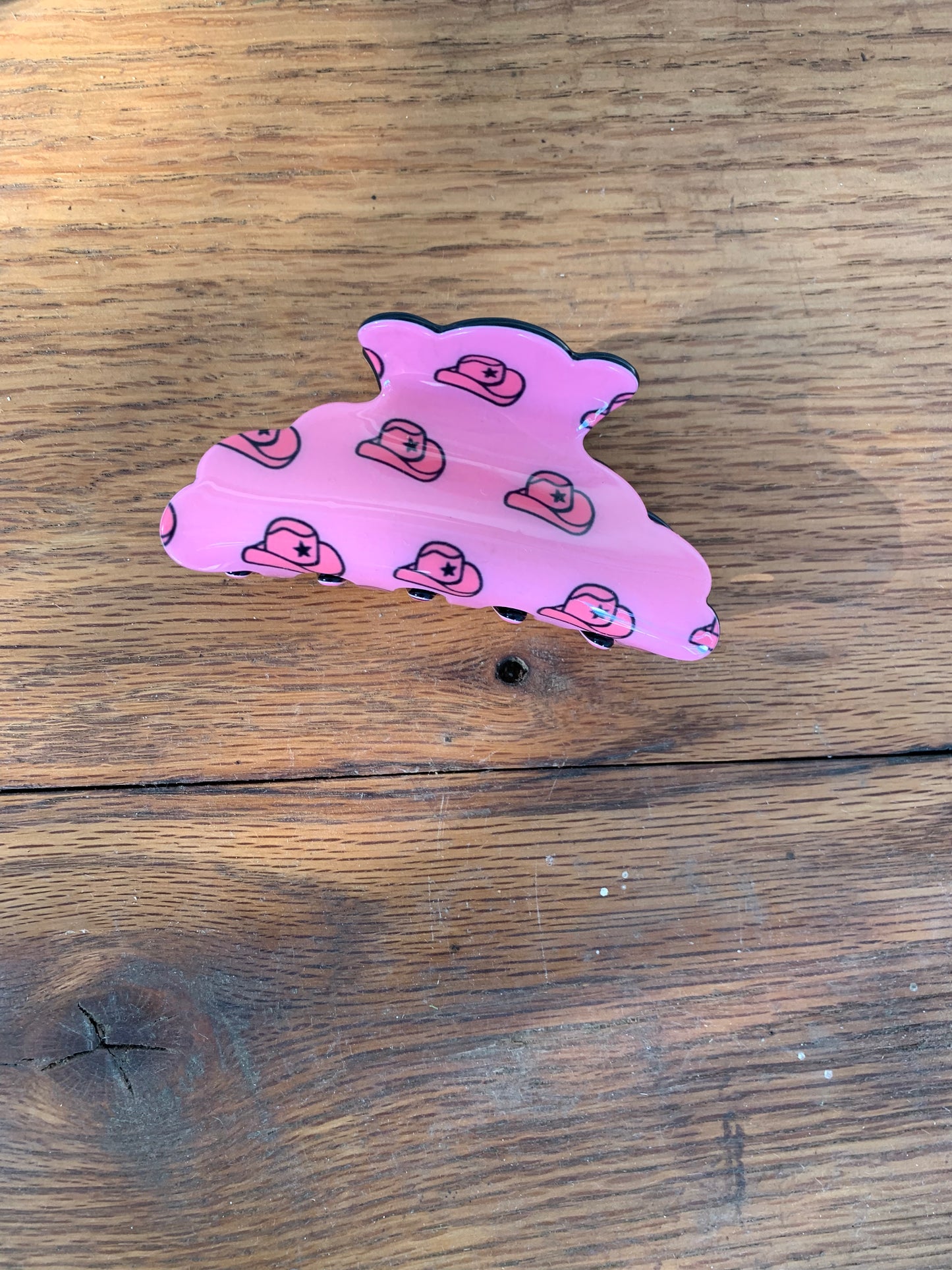 Clip with cowboy hats